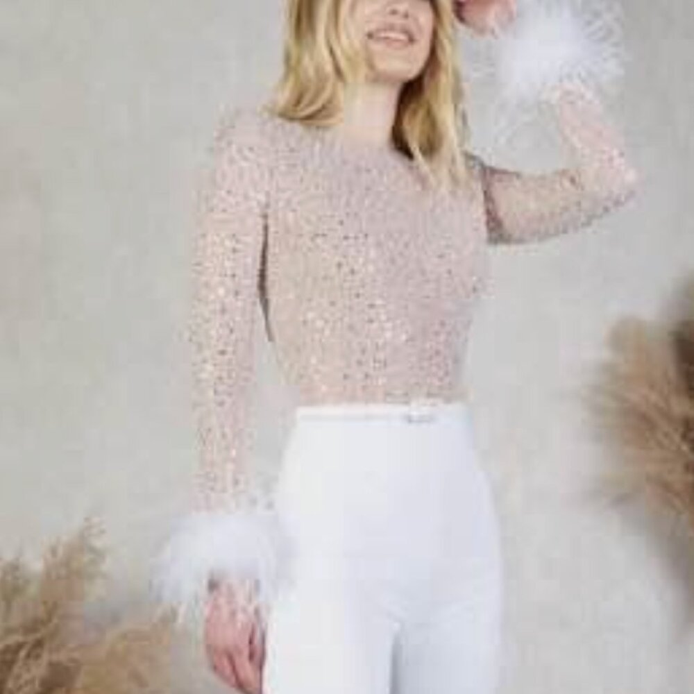 NADINE MERABI Blush Sequin Jumpsuit with White Feather Cuffs